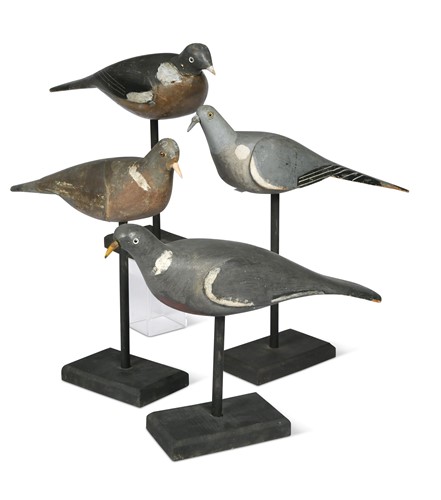 Lot 247 - A group of four decoy pigeons