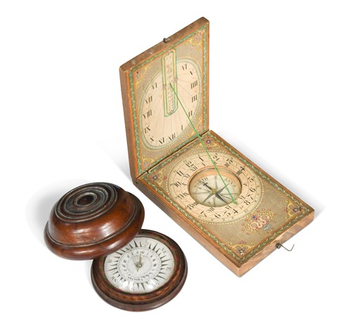 Lot 85 - Two small pocket compasses and a miniature globe, 19th century