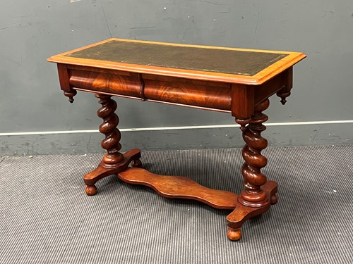 Lot 394 - A late Victorian mahogany writing table with...