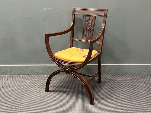Lot 390 - An Edwardian mahogany elbow chair of reeded x...