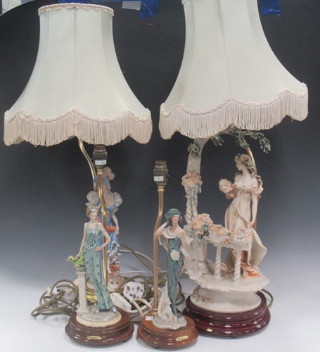 Lot 34 - Two modern moulded figural table lamps, a Capo...