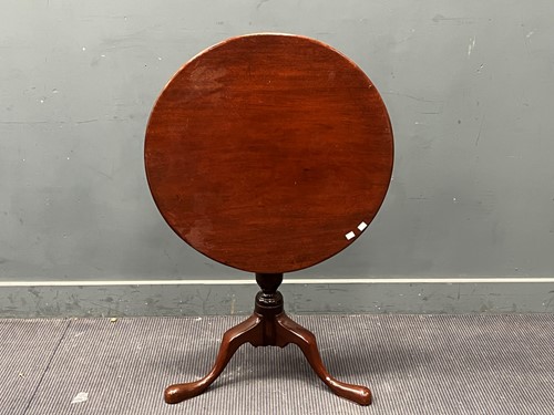 Lot 409 - A George III mahogany tripod table circular...