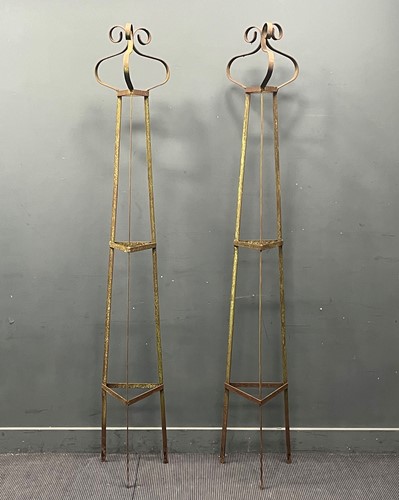 Lot 485 - A pair of hand forged wrought iron triangular...