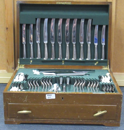 Lot 217 - A canteen of EPNS scroll end flatware for 8...