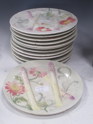 Lot 53 - A set of twelve asparagus plates marked St...