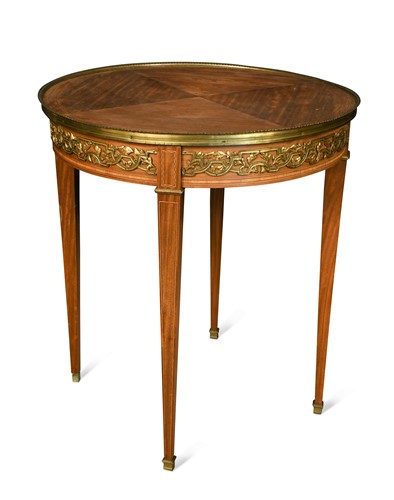 Lot 467 - A Louis XVI style satinwood and gilt metal mounted centre table