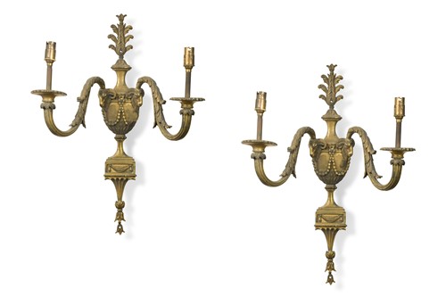 Lot 664 - A pair of gilt metal neo-classical two branch wall lights, 20th century