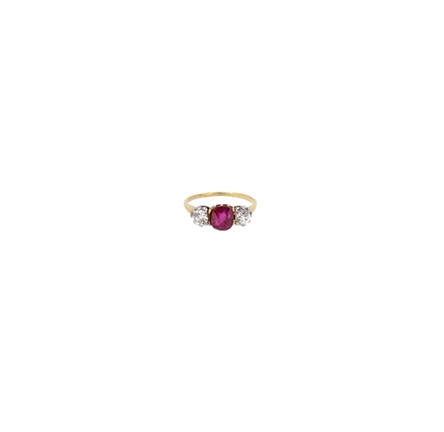 Lot 51 - A synthetic ruby and diamond three stone ring