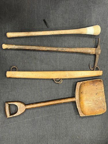 Lot 469 - Four rustic tools to include a shovel, yoke,...