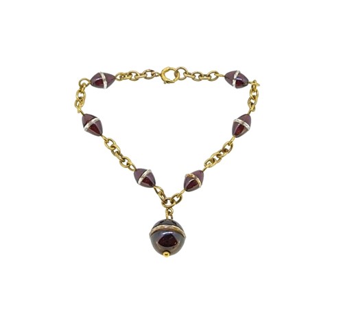 Lot 56 - A garnet and rock crystal bracelet