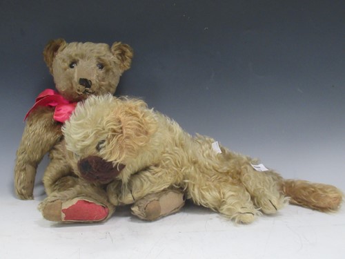 Lot 79 - A old teddy bear, probably 1920s, with long...