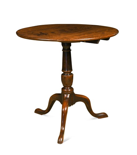 Lot 86 - A George III oak tilt-top side table