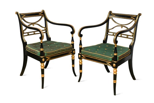 Lot 264 - A pair of Regency gilt and ebonised open armchairs