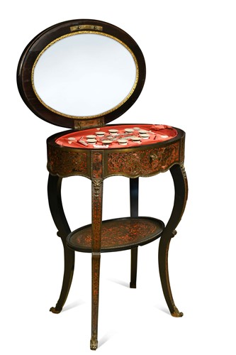 Lot 293 - An oval tortoiseshell and brass Boulle marquetry ebonised work table, 19th century