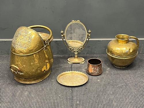 Lot 352 - A late 19th/ 20th century brass hammered...