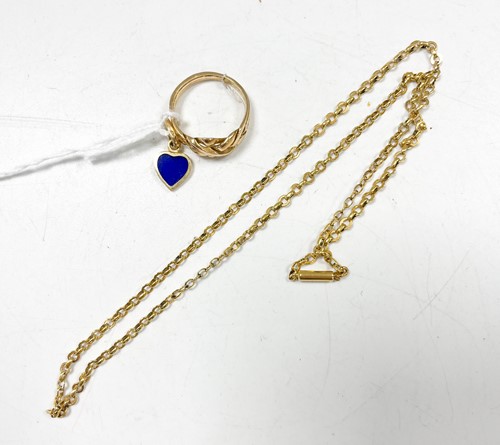 Lot 322 - A puzzle ring tested as 18ct gold, and a heart...