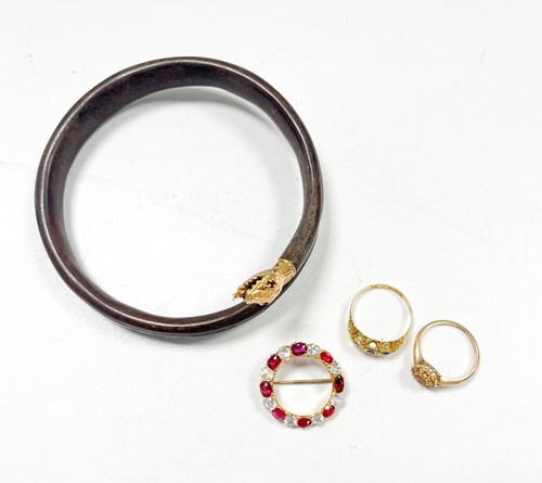 Lot 315 - A white sapphire and synthetic ruby circular...