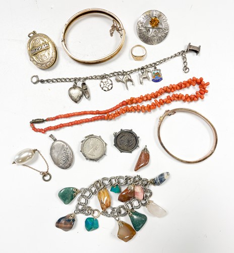 Lot 313 - A diamond set bangle (one stone lacking),...