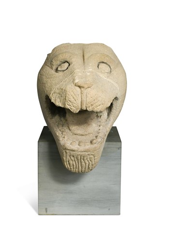 Lot 507 - Roman Antiquity, a carving of the head of a lion, probably part of an Etruscan tomb sculpture
