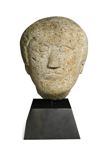 Lot 506 - A Romanesque carving of the head of a man, Iberian, 5th -12th century