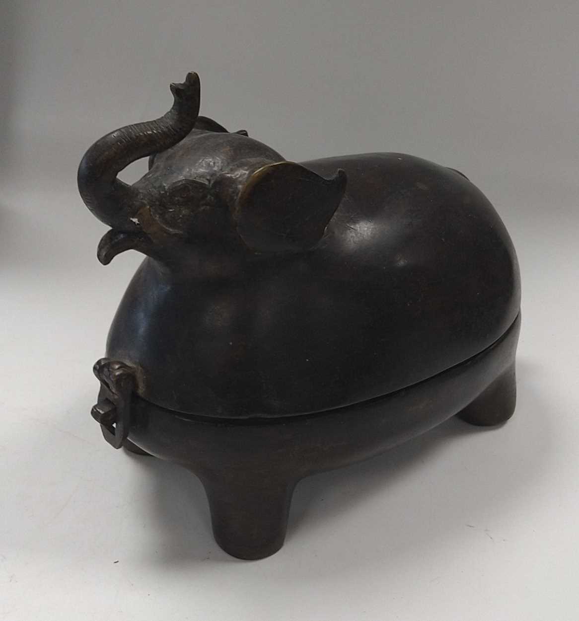 Lot 141 - An Asian bronze box and cover as an elephant