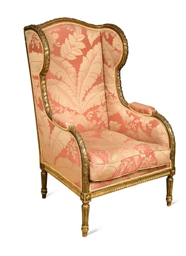 Lot 271 - A giltwood wingback armchair, 19th century