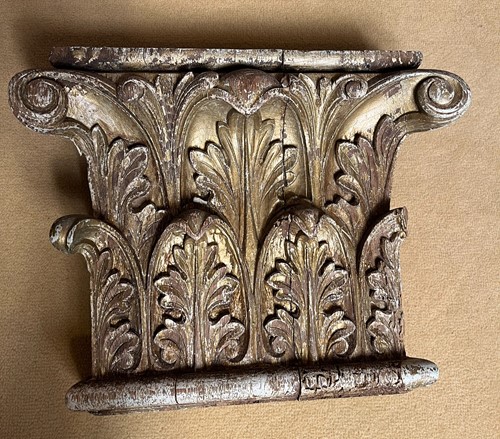Lot 62 - A pair of carved oak and 'gilt' painted Corinthian column capitals, 19th century