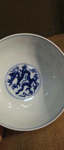 Lot 17 - A Chinese blue and white porcelain dragon bowl, bearing seal mark of Daoguang