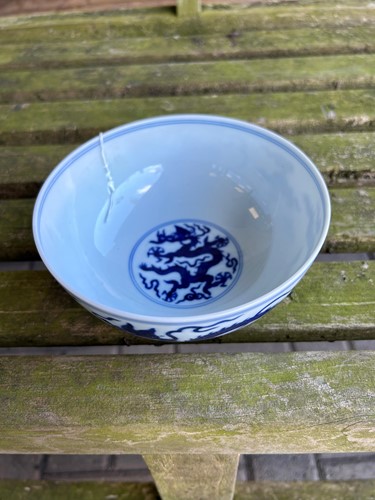 Lot 17 - A Chinese blue and white porcelain dragon bowl, bearing seal mark of Daoguang