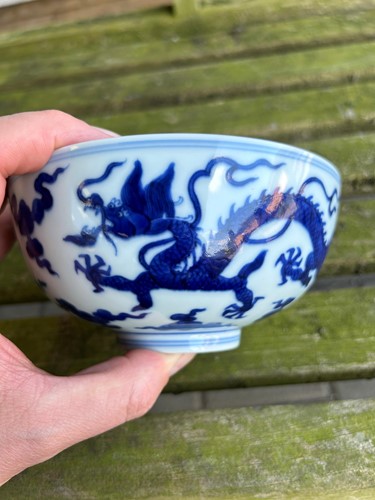 Lot 17 - A Chinese blue and white porcelain dragon bowl, bearing seal mark of Daoguang