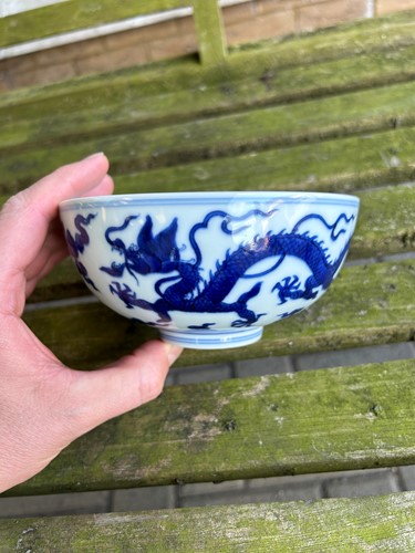 Lot 17 - A Chinese blue and white porcelain dragon bowl, bearing seal mark of Daoguang