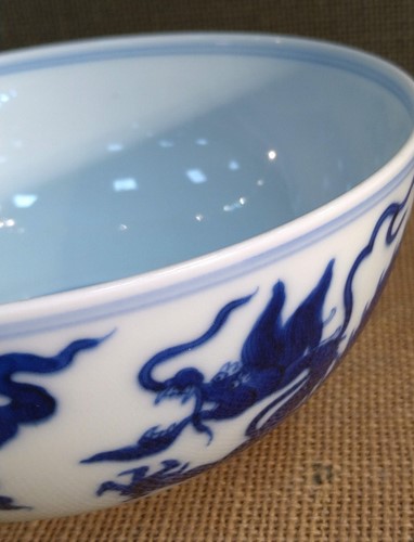 Lot 17 - A Chinese blue and white porcelain dragon bowl, bearing seal mark of Daoguang