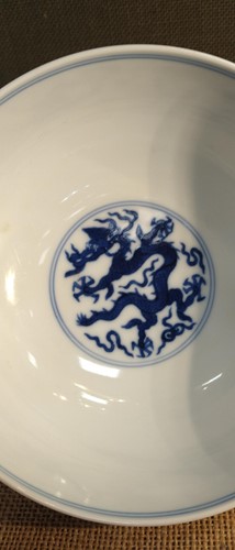 Lot 17 - A Chinese blue and white porcelain dragon bowl, bearing seal mark of Daoguang