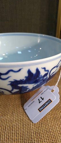 Lot 17 - A Chinese blue and white porcelain dragon bowl, bearing seal mark of Daoguang