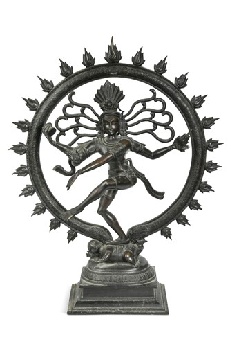 Lot 89 - An Indian bronze figure of Siva dancing on a dwarf, 19th/20th century