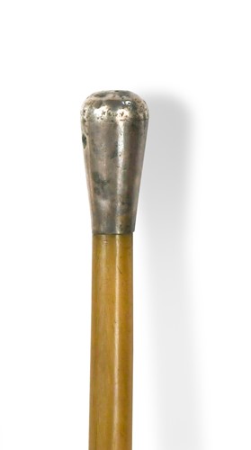 Lot 64 - A silver coloured metal rhino horn swagger stick, circa 1910