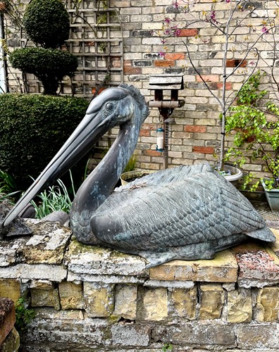 Lot 337 - A bronze model of a seated pelican, 20th century