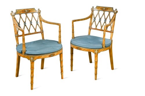 Lot 314 - A pair of Regency faux-bamboo open elbow chairs