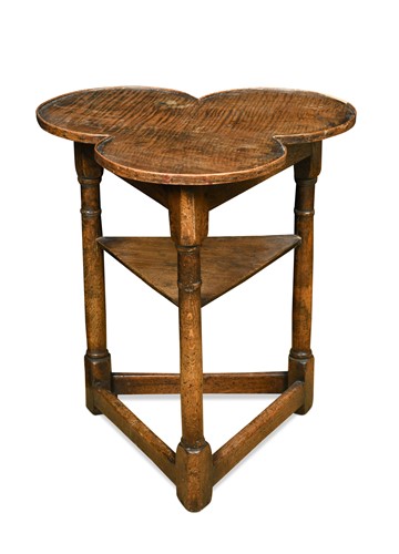 Lot 82 - An oak clover leaf top side table, 19th century