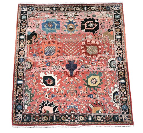 Lot 619 - A pink ground Agra carpet, late 20th century