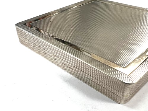 Lot 300 - A 20th century silver powder compact, mark of Asprey & Company