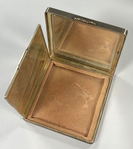 Lot 300 - A 20th century silver powder compact, mark of Asprey & Company