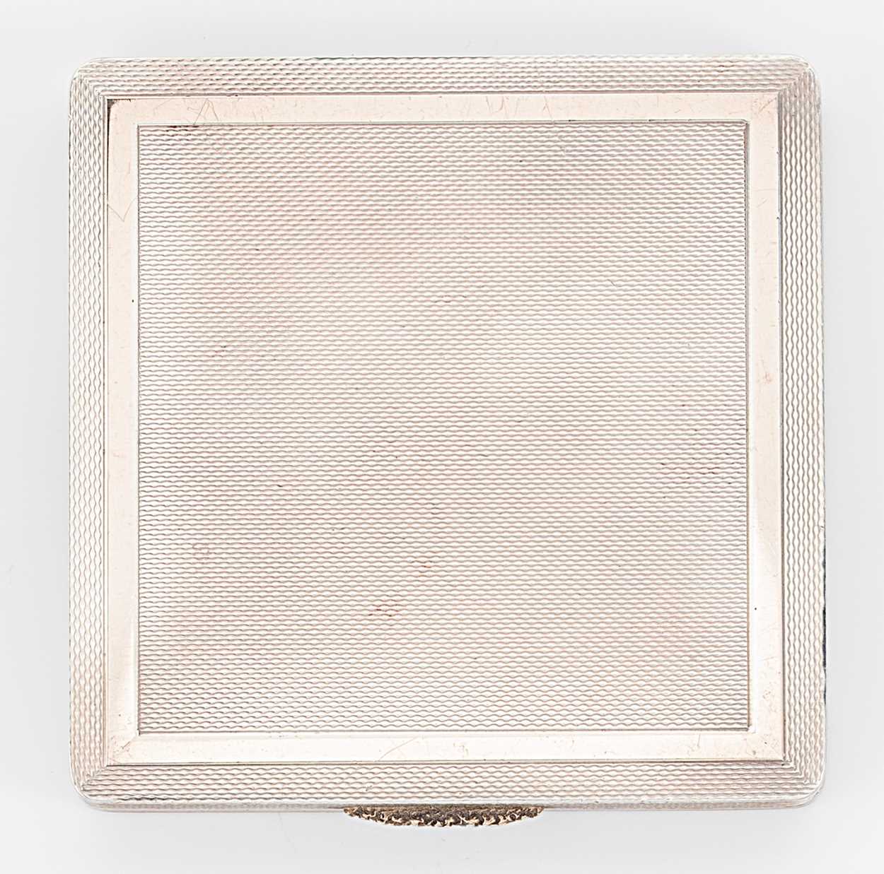 Lot 300 - A 20th century silver powder compact, mark of Asprey & Company