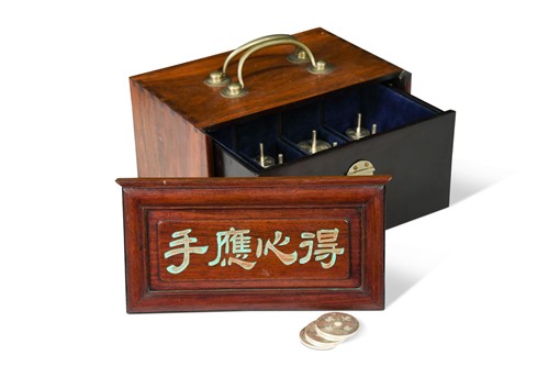 Lot 41 - A cased set of Chinese silver gaming tokens, early 20th century