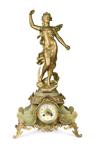 Lot 315 - A Continental gilt metal and onyx mantel clock, late 19th century