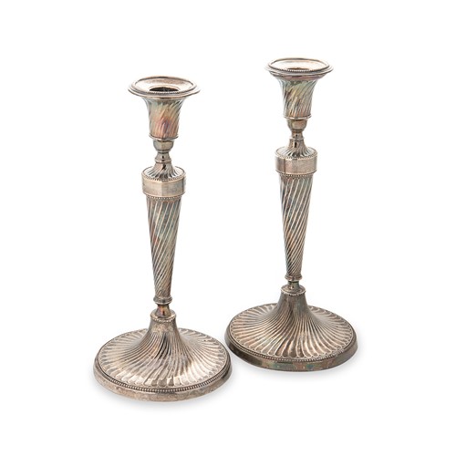 Lot 351 - A pair of George III 18th century silver candlesticks