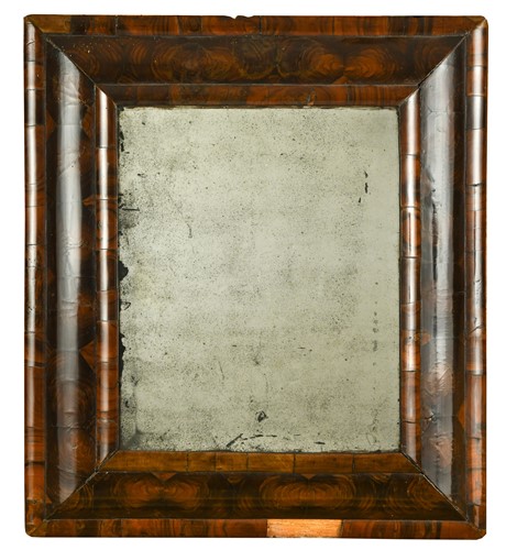 Lot 522 - A William & Mary olive wood oyster veneer cushion mirror