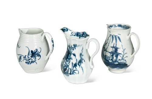 Lot 132 - Three Worcester blue and white cream jugs, 18th century