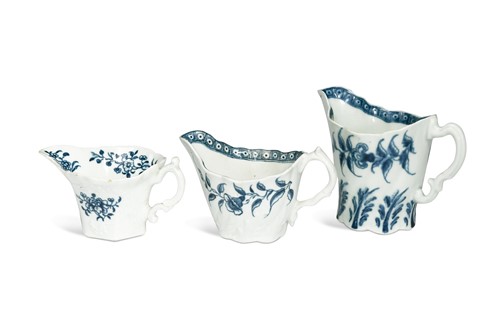 Lot 138 - Three Worcester blue and white cream jugs, 18th century