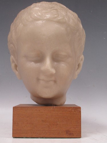 Lot 54 - A museum composition facsimile head of Eros,...